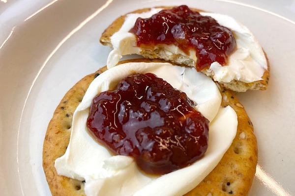 tomato jam with cream cheese on crackers