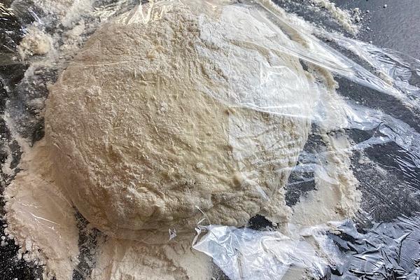 dough under cellophane 