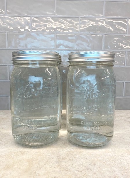 canned water on a countertop.