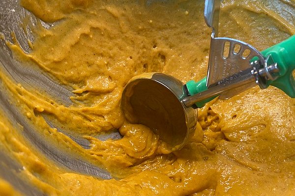 scooping the pumpkin batter