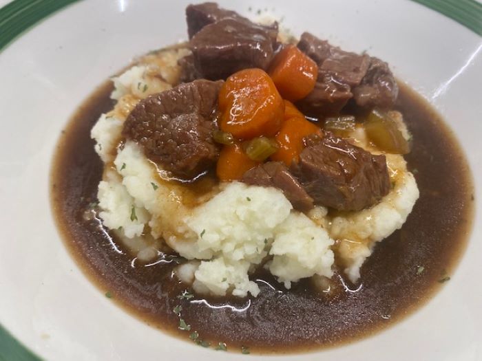 irish stew over mashed potatoes