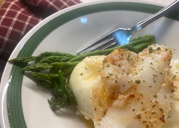 butter baked cod served