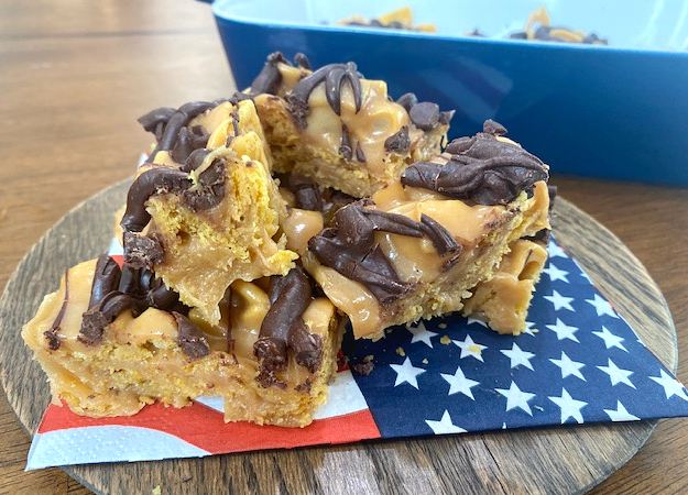 slices of Frito Bars With Peanut Butter Recipe on an american flag napkin