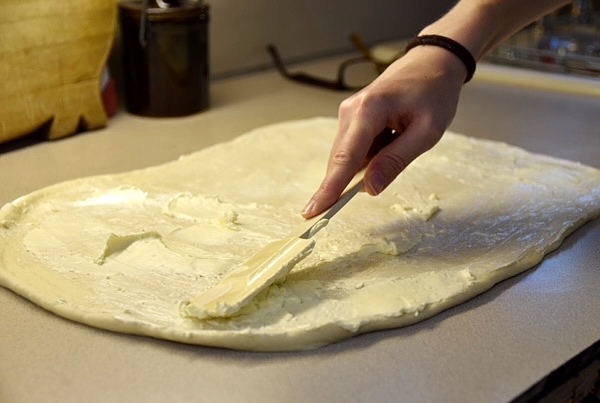 buttering the dough