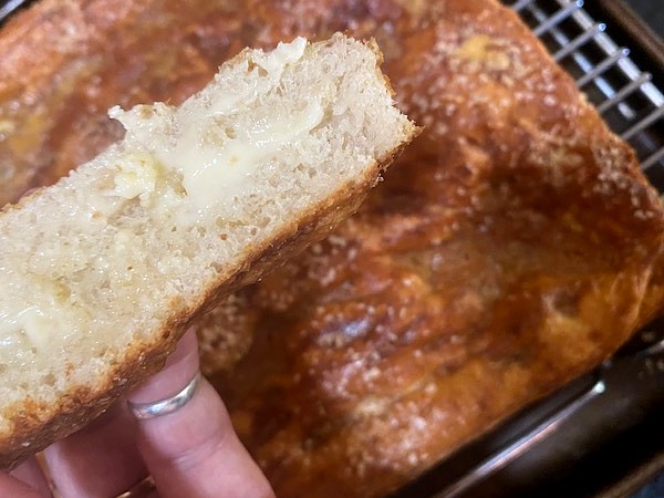 butter on a piece of focaccia