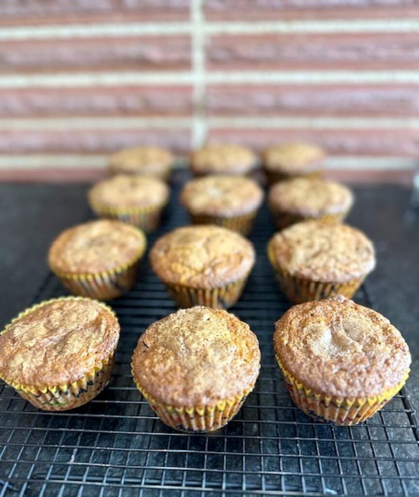 raisin bran muffins cooling on a rack